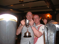 Colin West and Stev Rowbottom (aka The Fat Bald Kid) showing the trophy off.