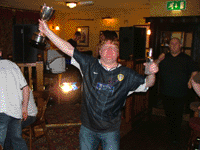 Allan Ellis celebrating Sheps win